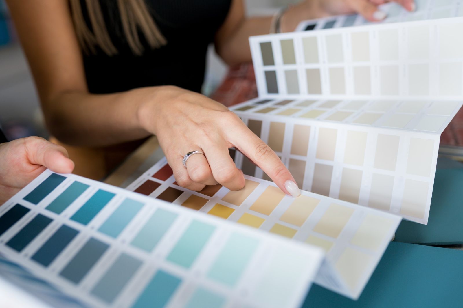 Woman choosing paint color